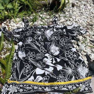 Vibrant Black and White Tropical print cold shoulder INC top.